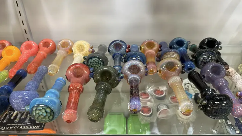 small dark colored glass pipes